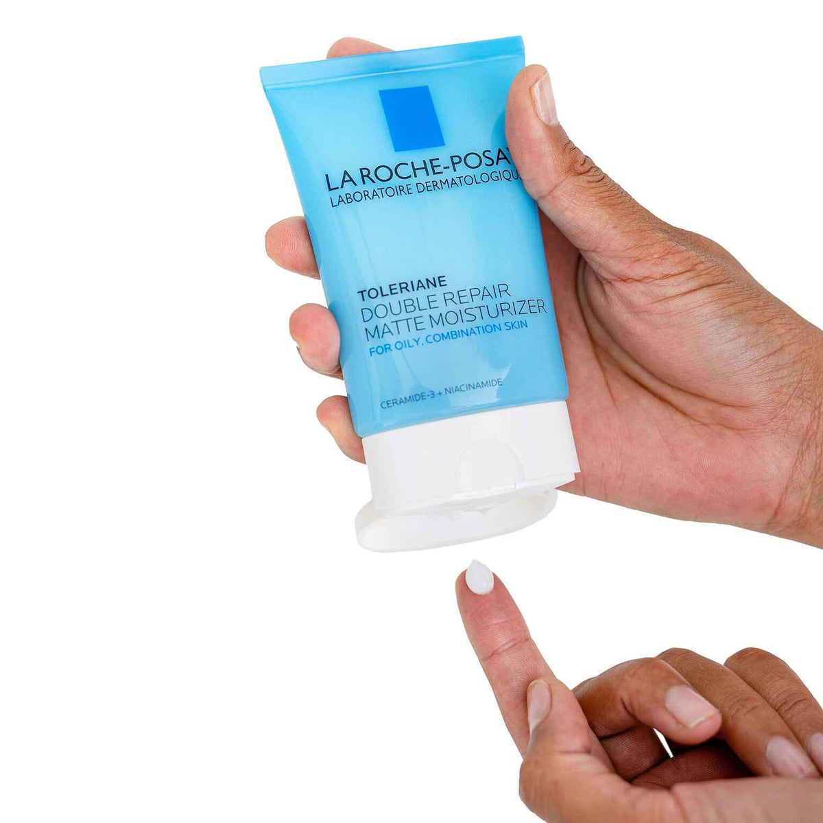 toleriane-double-repair-matte-face-moisturizer-for-oily-skin-w7 la-roche-posay-toleriane-matte-lotion-on-finger.jpg
